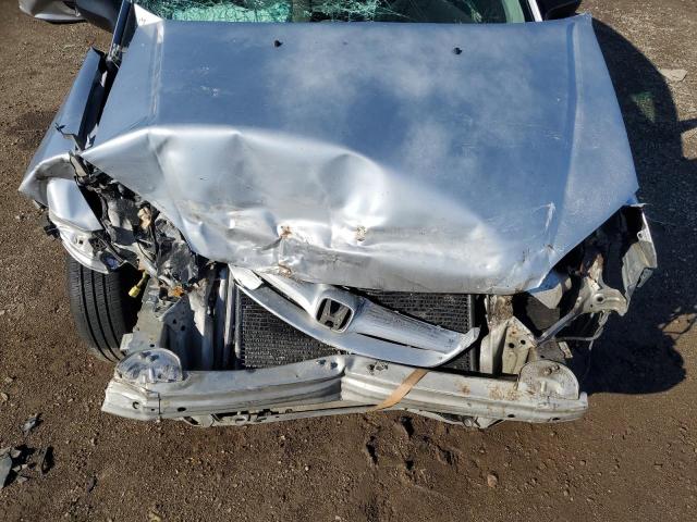 2HGES16384H630083 - 2004 HONDA CIVIC DX VP SILVER photo 11