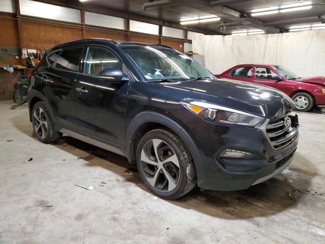 KM8J3CA23JU821273 - 2018 HYUNDAI TUCSON VALUE BLACK photo 4