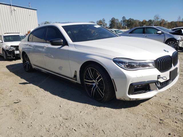 WBA7F2C57GGE12370 - 2016 BMW 750 XI WHITE photo 4