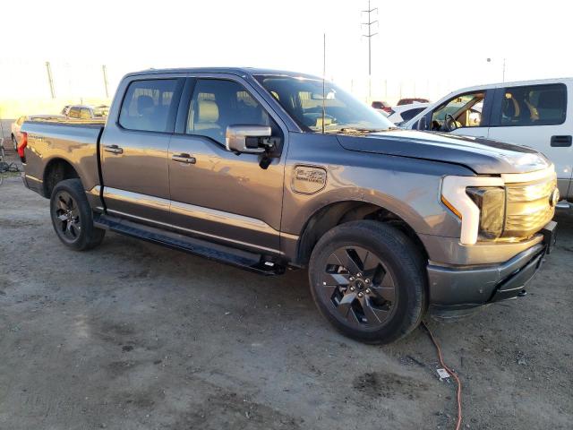 1FTVW1EL7NWG16683 - 2022 FORD F150 LIGHTNING PRO GRAY photo 4