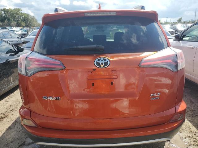 JTMRFREV0GJ080189 - 2016 TOYOTA RAV4 XLE ORANGE photo 6