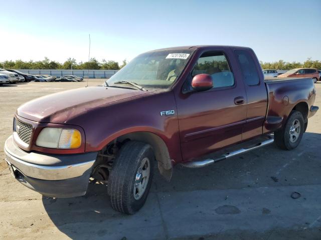 1FTZX0720XKB38579 - 1999 FORD F150 BURGUNDY photo 1