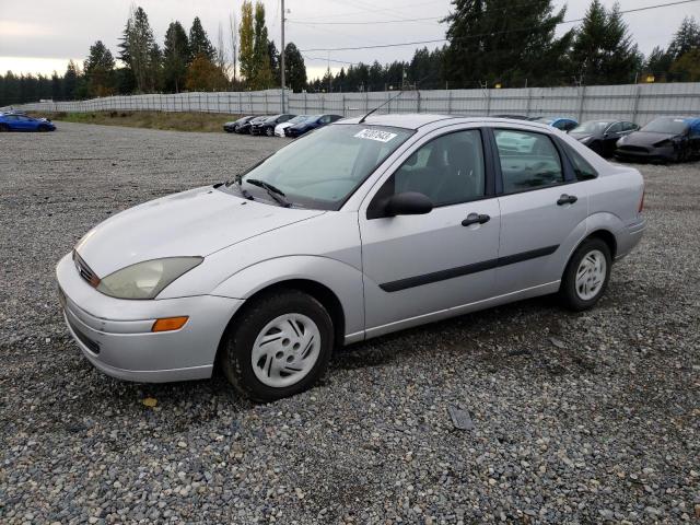 1FAFP33ZX4W147386 - 2004 FORD FOCUS LX SILVER photo 1