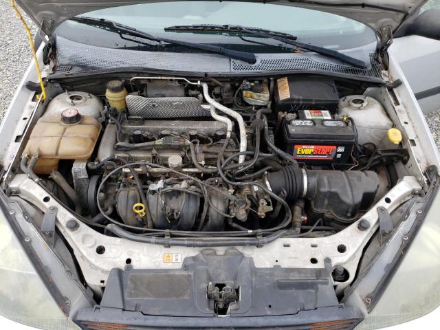 1FAFP33ZX4W147386 - 2004 FORD FOCUS LX SILVER photo 11