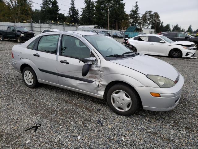1FAFP33ZX4W147386 - 2004 FORD FOCUS LX SILVER photo 4