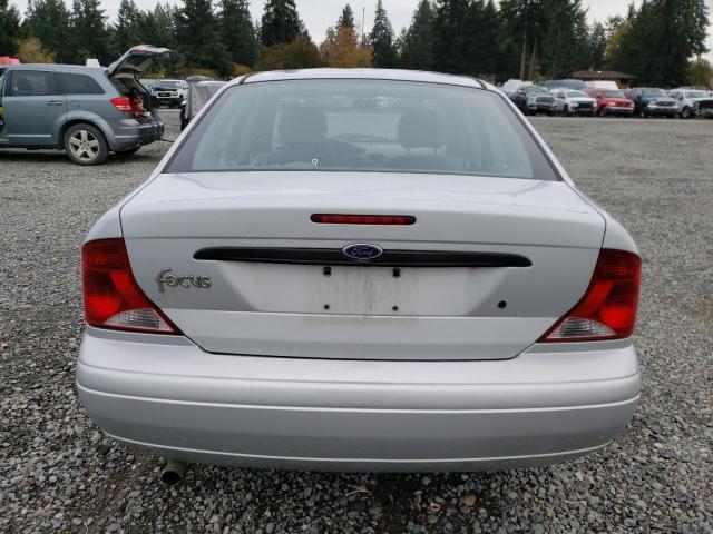 1FAFP33ZX4W147386 - 2004 FORD FOCUS LX SILVER photo 6