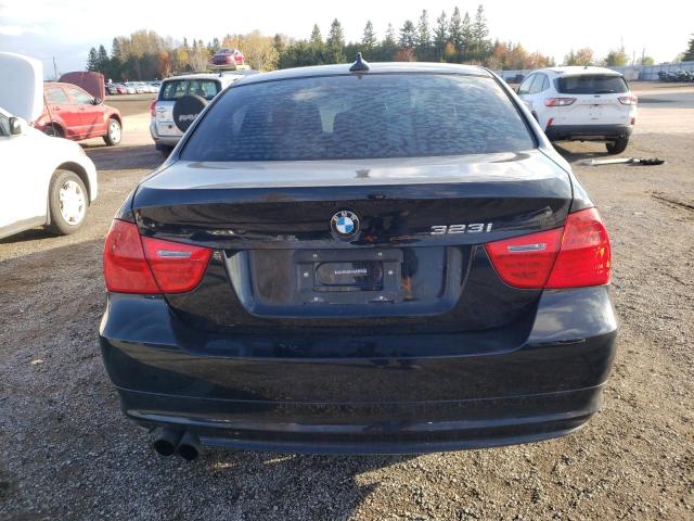 WBAPG73579A401012 - 2009 BMW 323 I BLACK photo 6