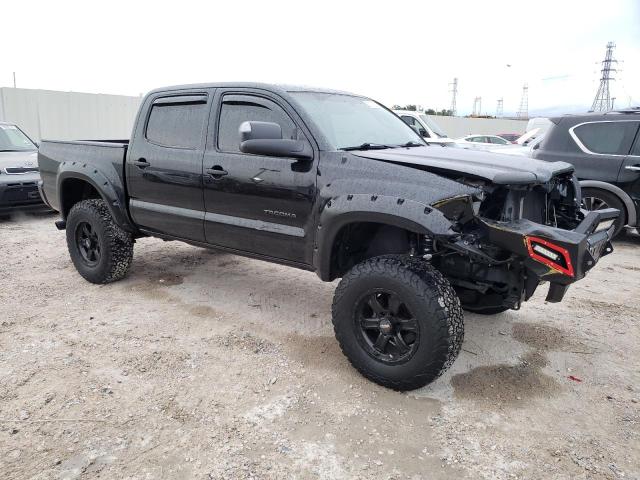 5TFJU4GN9BX006066 - 2011 TOYOTA TACOMA DOUBLE CAB PRERUNNER BLACK photo 4