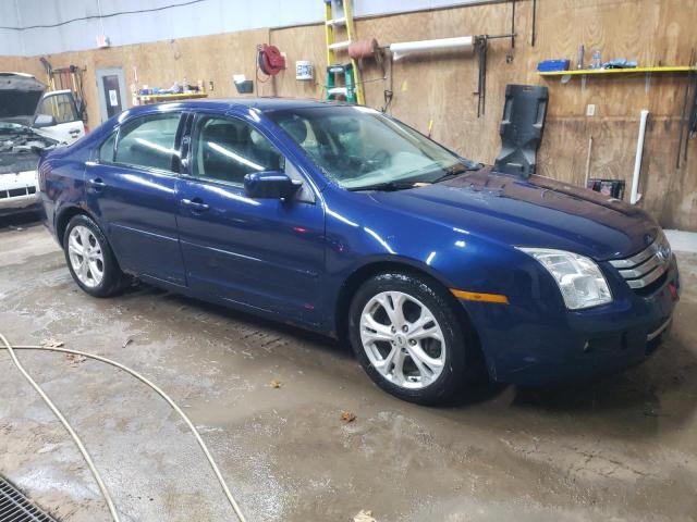 3FAFP07Z36R243164 - 2006 FORD FUSION SE BLUE photo 4