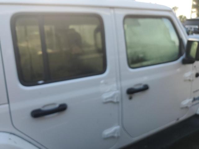 1C4JJXP64NW184514 - 2022 JEEP WRANGLER U SAHARA 4XE WHITE photo 12