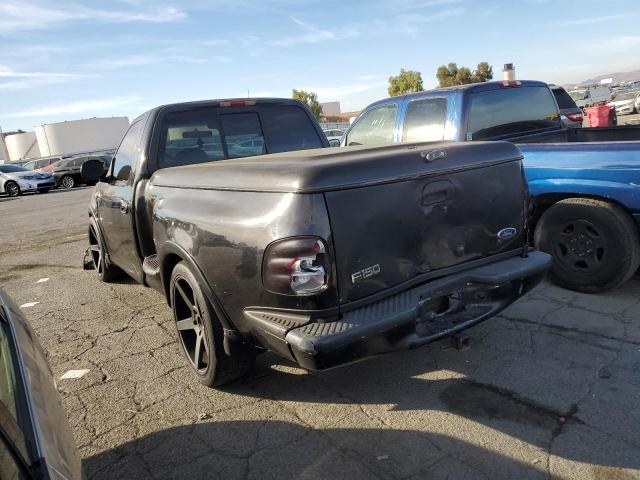 2FTRF07L3WCB20365 - 1998 FORD F150 BLACK photo 2