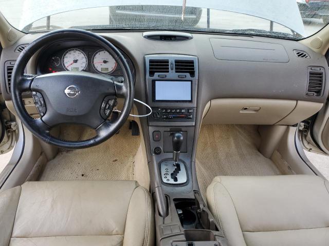 JN1DA31D22T200500 - 2002 NISSAN MAXIMA GLE GOLD photo 8