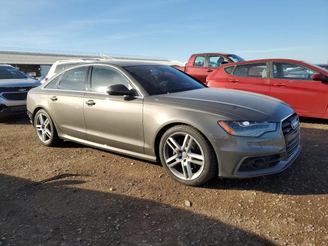 WAUHMAFC6FN022446 - 2015 AUDI A6 PRESTIGE BROWN photo 4