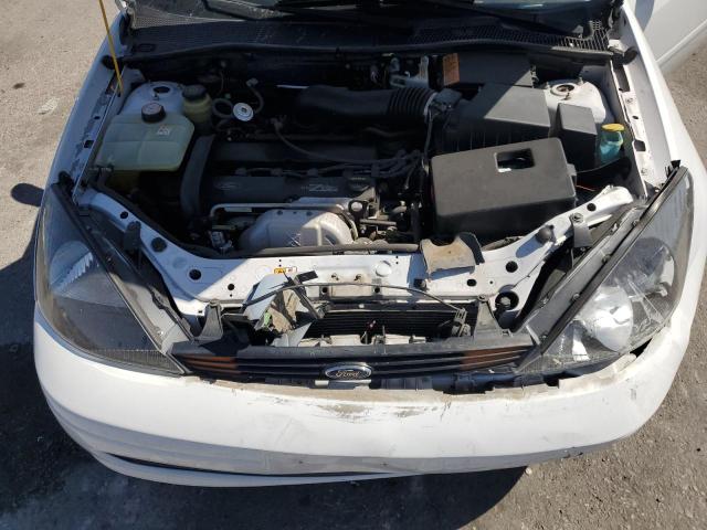 1FAFP36314W203884 - 2004 FORD FOCUS SE WHITE photo 11