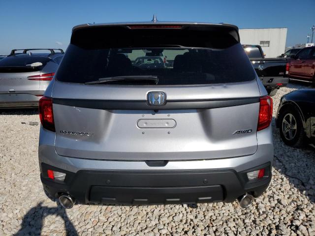 5FNYF8H56PB035993 - 2023 HONDA PASSPORT EXL SILVER photo 6