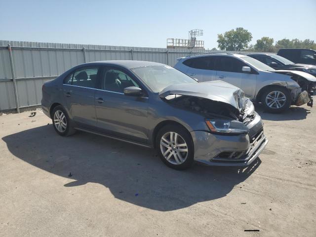 3VW2B7AJ5HM329169 - 2017 VOLKSWAGEN JETTA S GRAY photo 4