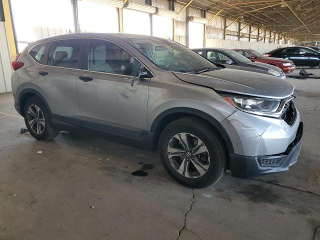 7FARW5H3XHE000803 - 2017 HONDA CR-V LX SILVER photo 4