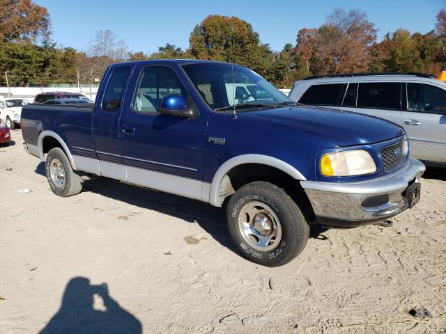 1FTEX18L0VND02310 - 1997 FORD F150 BLUE photo 4