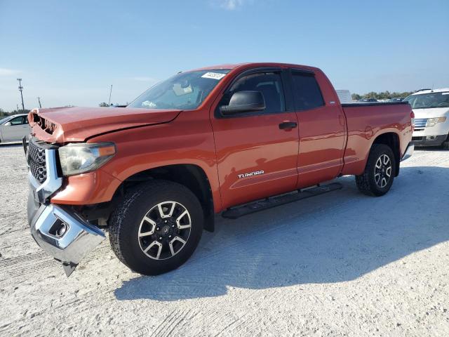 5TFRM5F17JX126471 - 2018 TOYOTA TUNDRA DOUBLE CAB SR/SR5 ORANGE photo 1