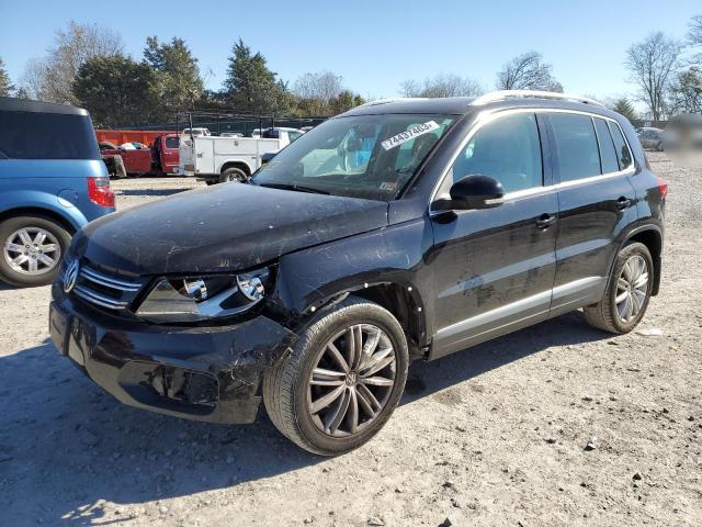 WVGBV3AX4DW567303 - 2013 VOLKSWAGEN TIGUAN S BLACK photo 1