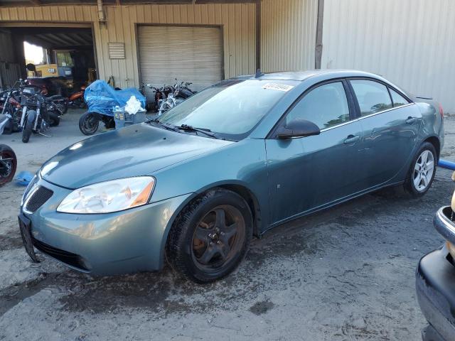 1G2ZG57B494172176 - 2009 PONTIAC G6 GREEN photo 1