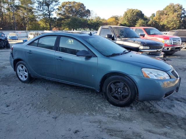 1G2ZG57B494172176 - 2009 PONTIAC G6 GREEN photo 4