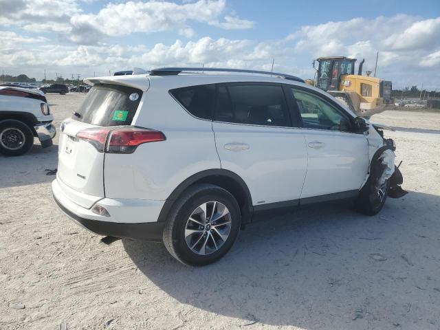 JTMRJREV6JD182620 - 2018 TOYOTA RAV4 HV LE WHITE photo 3