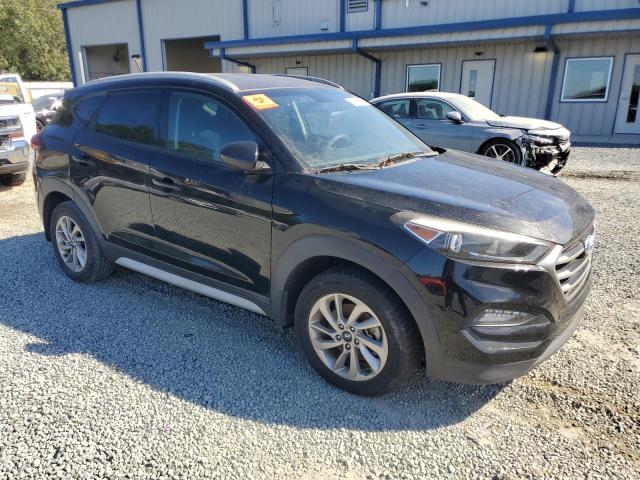 KM8J33A43HU401718 - 2017 HYUNDAI TUCSON LIMITED BLACK photo 4