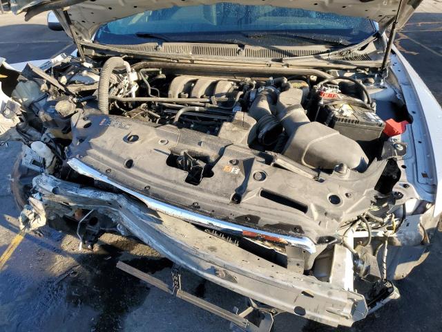 1FAHP2E89HG117268 - 2017 FORD TAURUS SEL SILVER photo 11