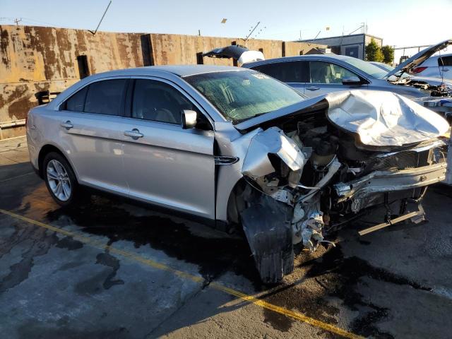 1FAHP2E89HG117268 - 2017 FORD TAURUS SEL SILVER photo 4