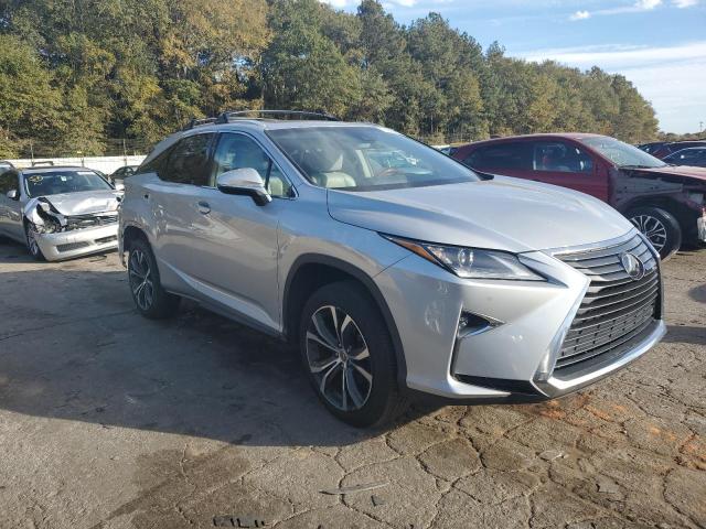 2T2ZZMCA3GC028699 - 2016 LEXUS RX 350 SILVER photo 4