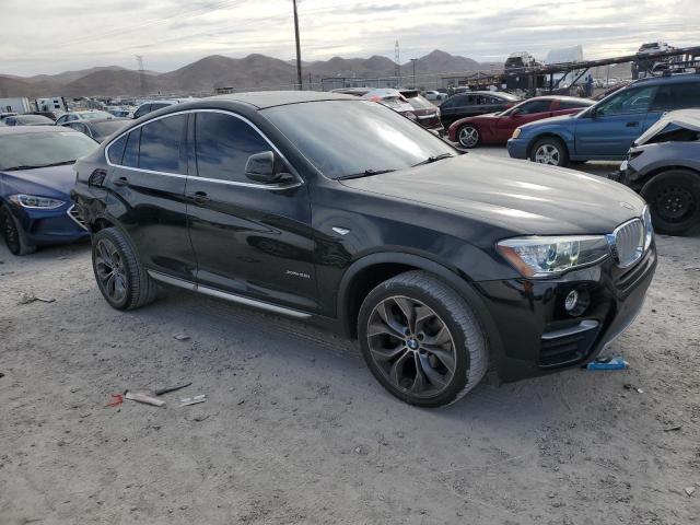 5UXXW3C57J0T80623 - 2018 BMW X4 XDRIVE28I შავი ფოტო 4