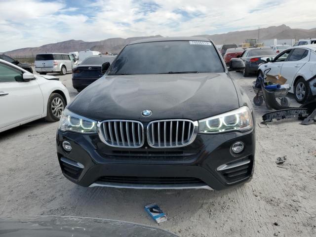 5UXXW3C57J0T80623 - 2018 BMW X4 XDRIVE28I შავი ფოტო 5