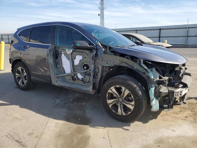 2HKRW5H39JH415632 - 2018 HONDA CR-V LX GRAY photo 4