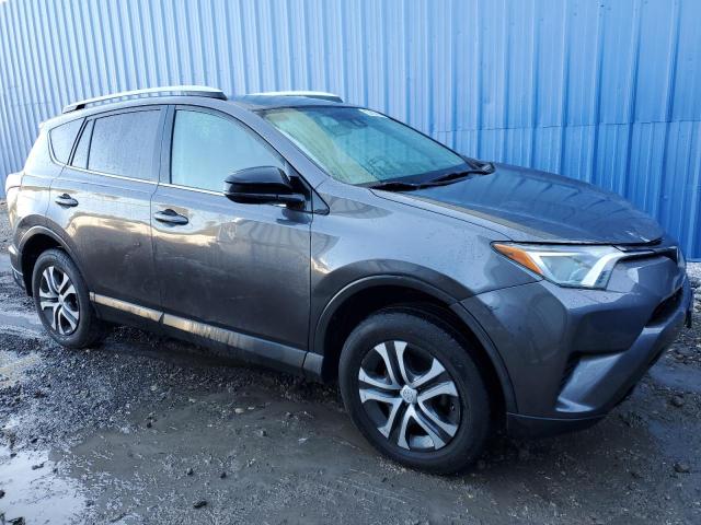 2T3ZFREV5HW350729 - 2017 TOYOTA RAV4 LE GRAY photo 4