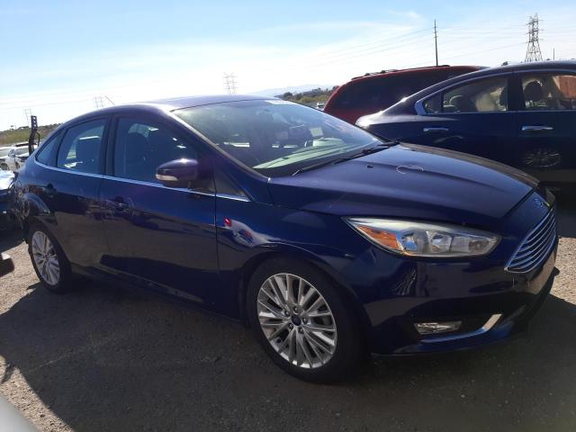 1FADP3J22HL202000 - 2017 FORD FOCUS TITANIUM BLUE photo 4