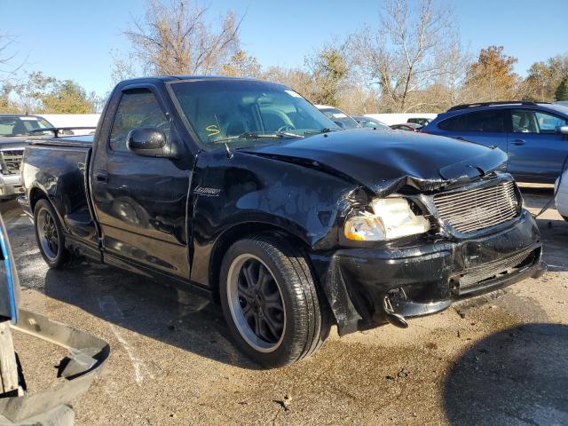 2FTZF0732YCB06783 - 2000 FORD F150 SVT LIGHTNING BLACK photo 4