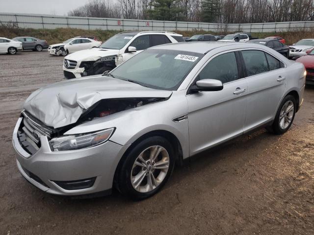 1FAHP2H8XGG153691 - 2016 FORD TAURUS SEL SILVER photo 1