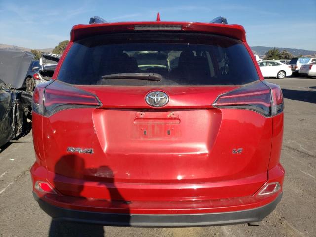 2T3ZFREV1GW255454 - 2016 TOYOTA RAV4 LE RED photo 6