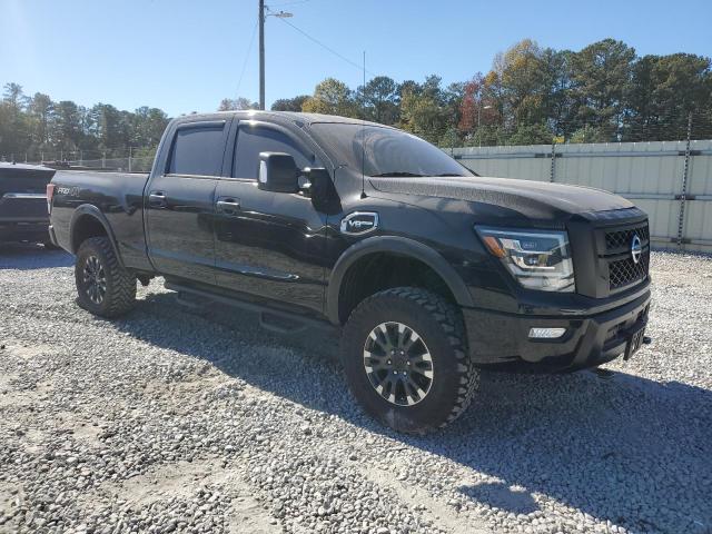 1N6AA1FB7LN509832 - 2020 NISSAN TITAN XD SV BLACK photo 4