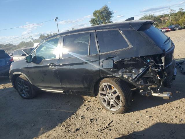 5FNYF8H57PB036134 - 2023 HONDA PASSPORT EXL BLACK photo 2