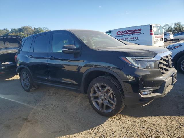 5FNYF8H57PB036134 - 2023 HONDA PASSPORT EXL BLACK photo 4