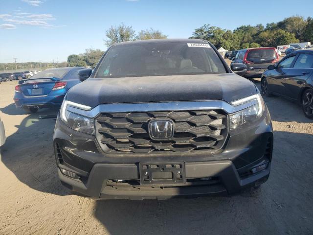 5FNYF8H57PB036134 - 2023 HONDA PASSPORT EXL BLACK photo 5