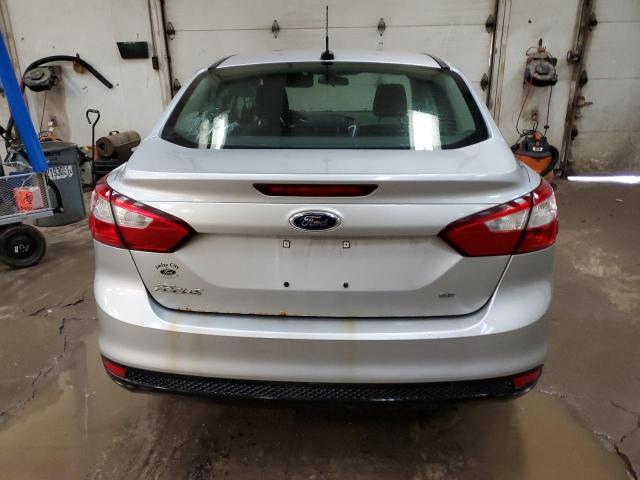 1FAHP3F28CL311595 - 2012 FORD FOCUS SE SILVER photo 6