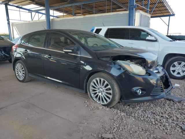 1FAHP3N2XCL391631 - 2012 FORD FOCUS TITANIUM BLACK photo 4