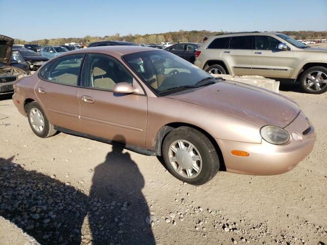 1FALP52U9VA245845 - 1997 FORD TAURUS GL GOLD photo 4