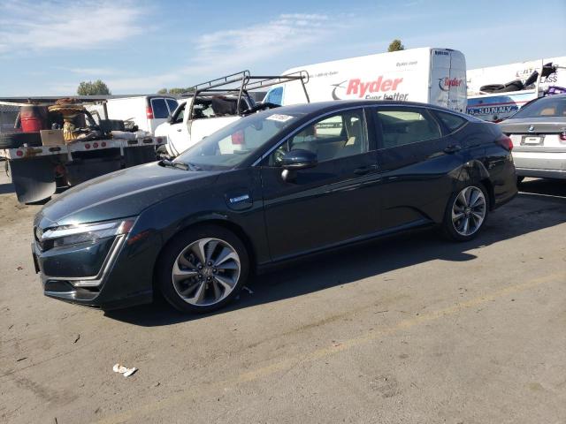 JHMZC5F13JC009429 - 2018 HONDA CLARITY TEAL photo 1