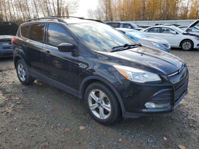 1FMCU9GX6EUA95636 - 2014 FORD ESCAPE SE BLACK photo 4