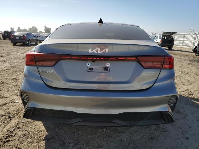 3KPF24AD7PE505547 - 2023 KIA FORTE LX GRAY photo 6