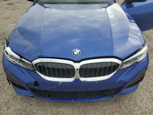 3MW5R1J06N8C42088 - 2022 BMW 330I BLUE photo 11